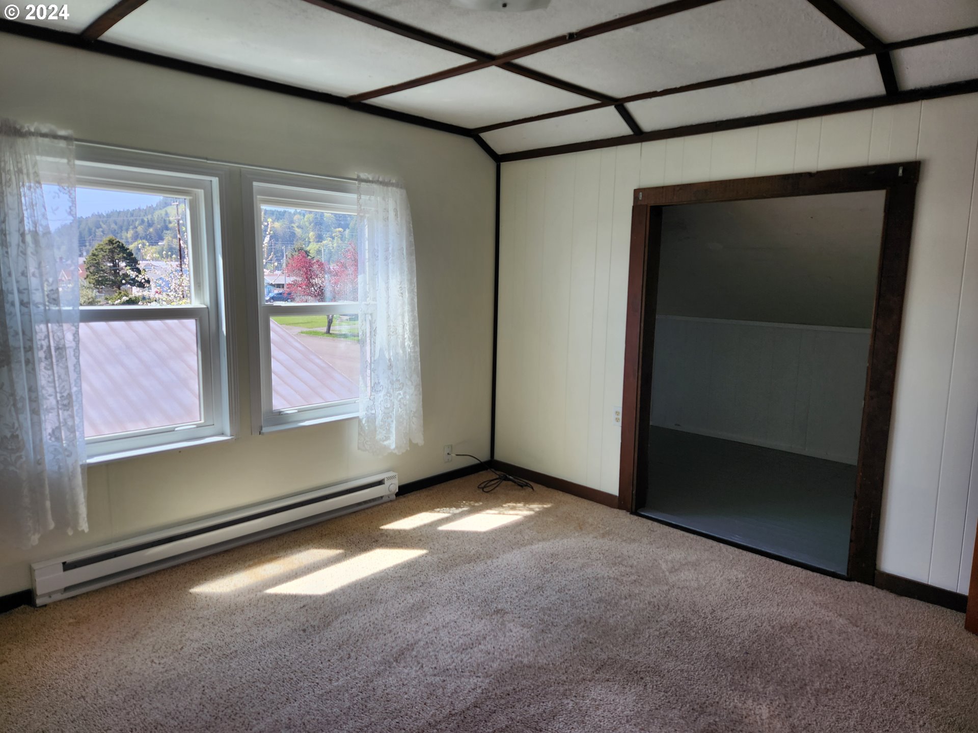 912 Fir Avenue Reedsport, OR 97467 - Photo 33 of 40 a view of an empty room with window