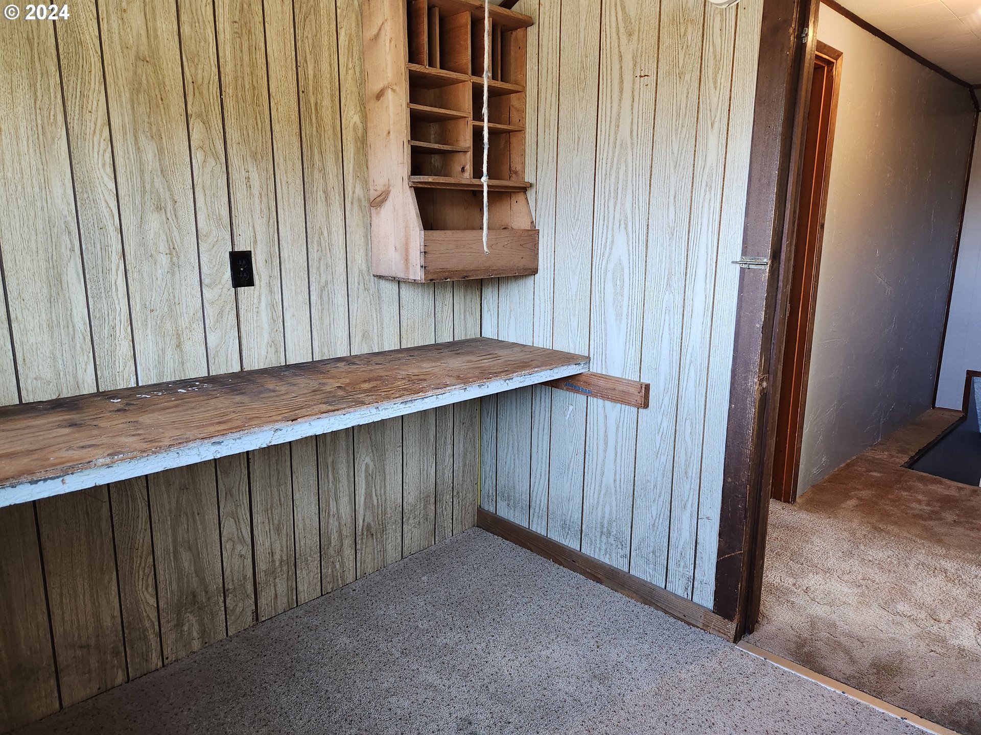 912 Fir Avenue Reedsport, OR 97467 - Photo 37 of 40 a kitchen with a wooden table and chair
