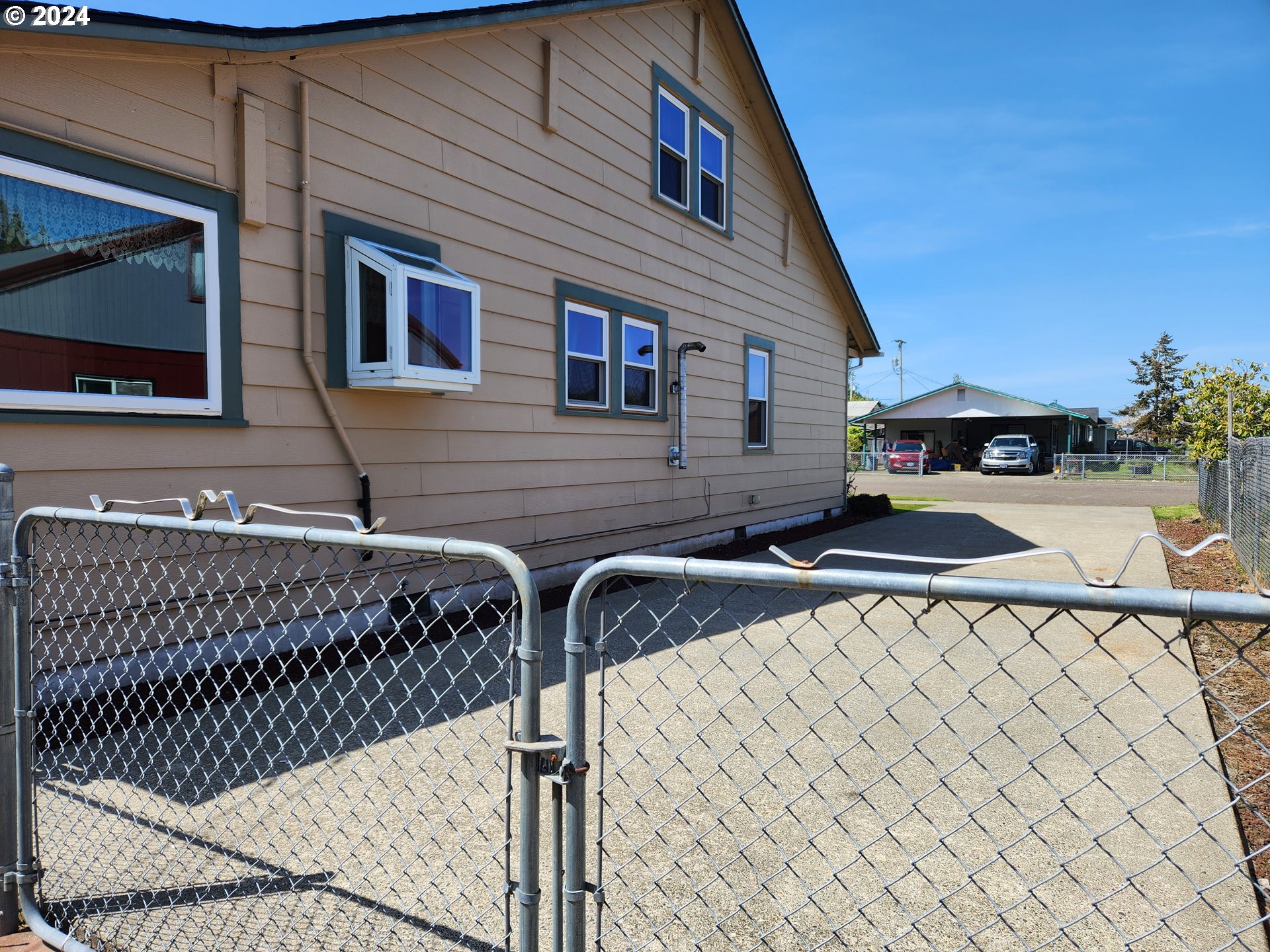 912 Fir Avenue Reedsport, OR 97467 - Photo 6 of 40 a view of a house with a street