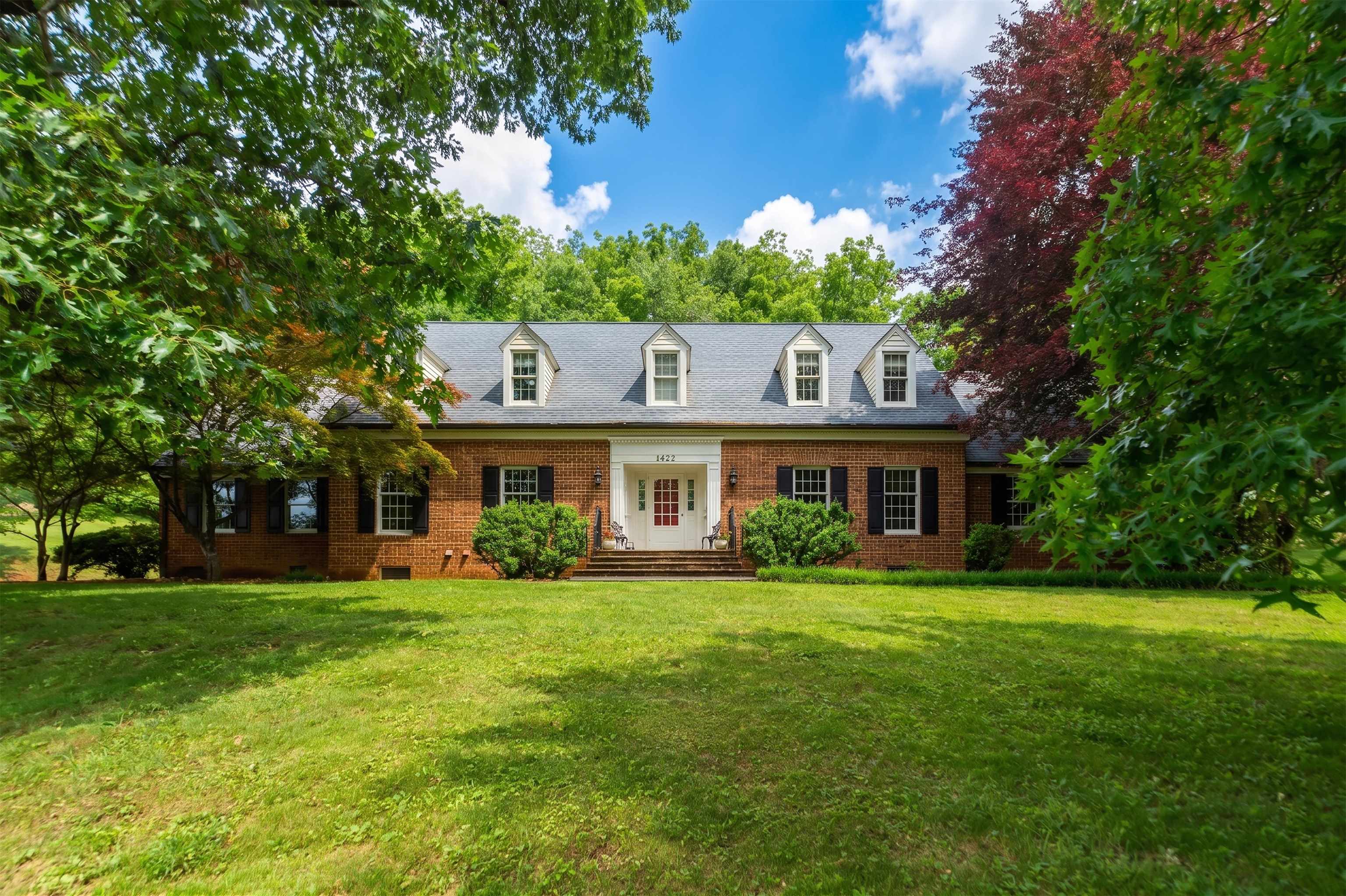 1430 Dogwood Road Staunton, VA 24401 - Photo 2 of 68 a front view of a house with a yard
