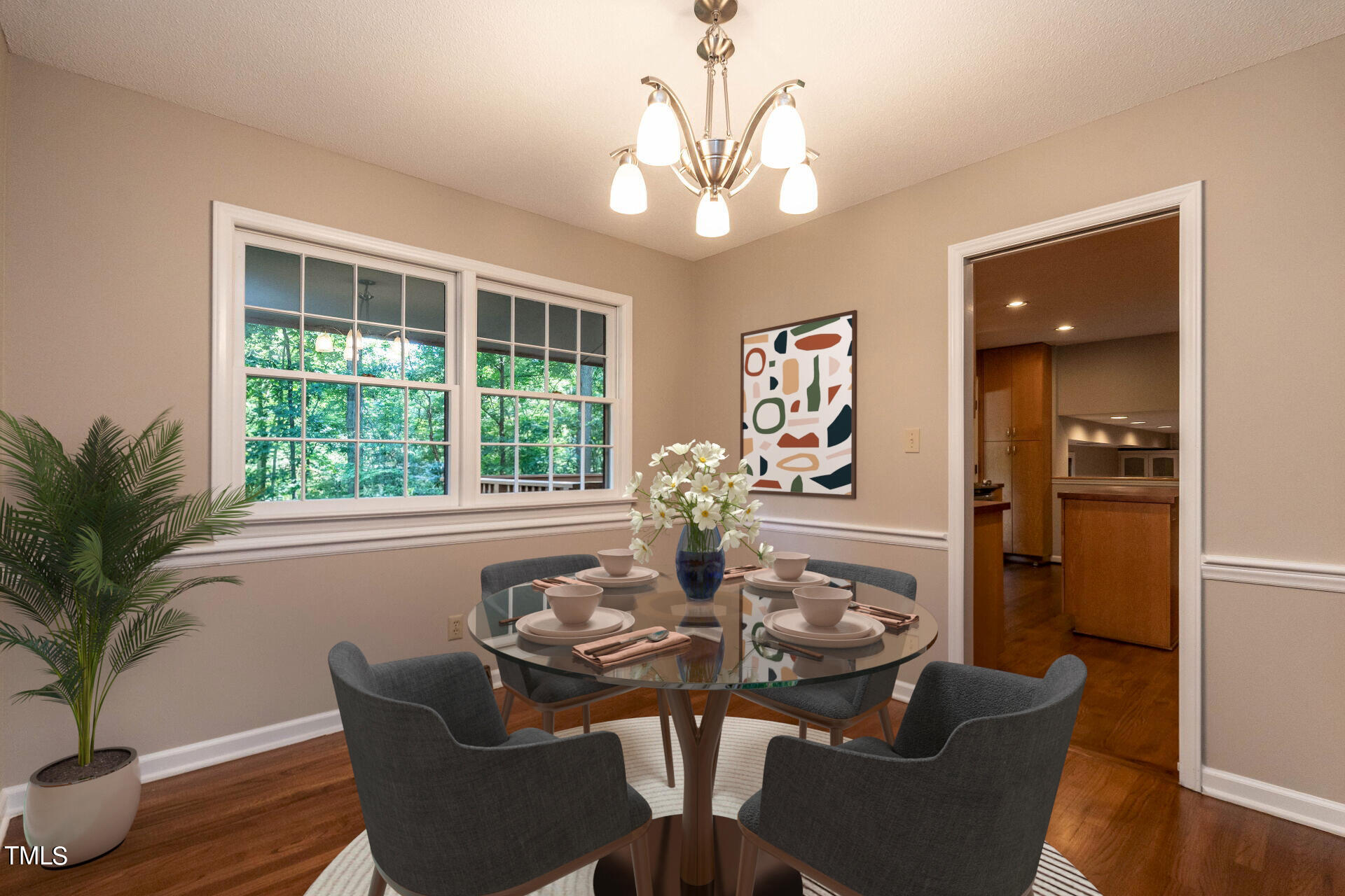 6604 Brandywine Road Raleigh, NC 27607 - Photo 4 of 46 a view of a dining room with furniture window and wooden floor