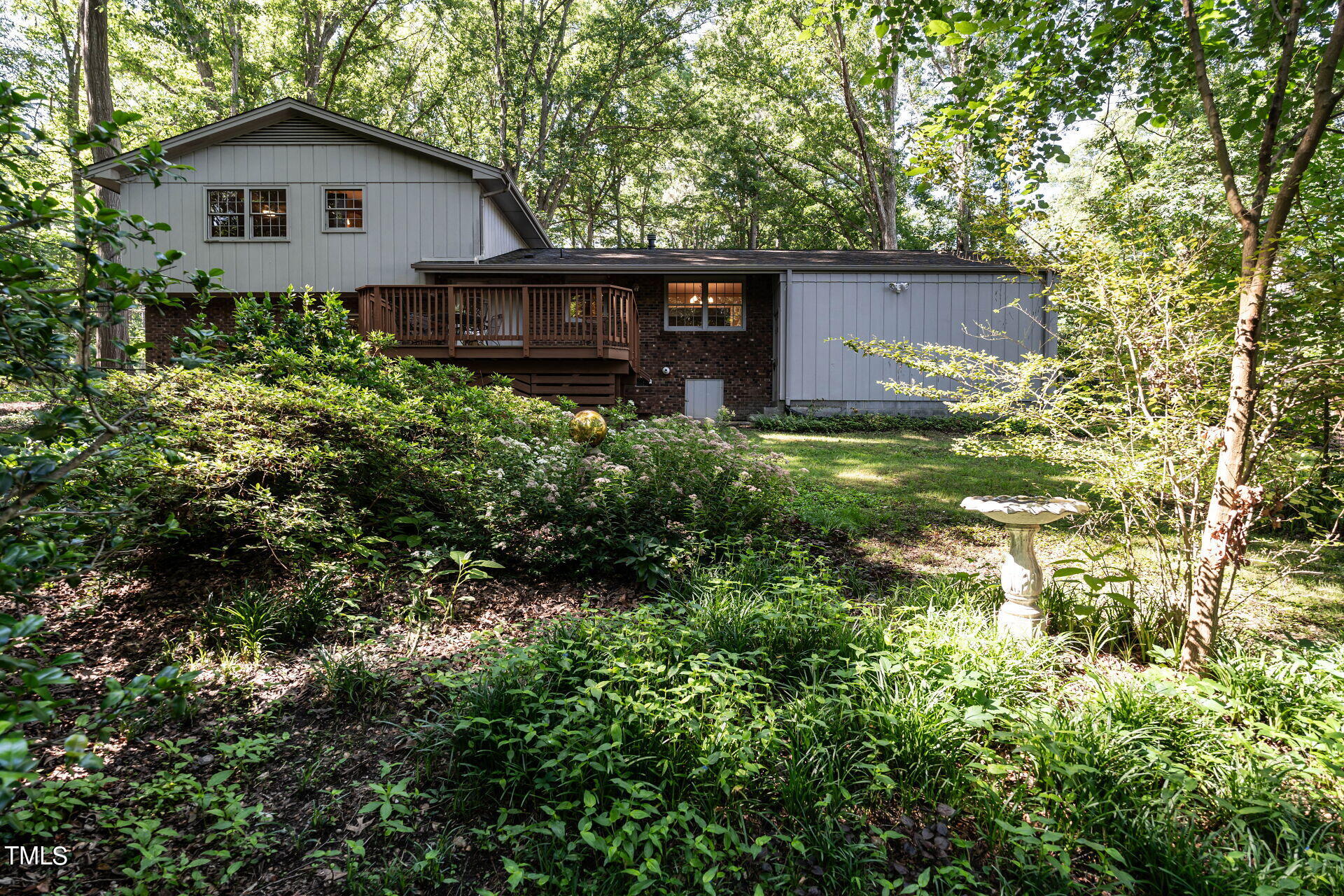 6604 Brandywine Road Raleigh, NC 27607 - Photo 41 of 46 a view of a house with a yard