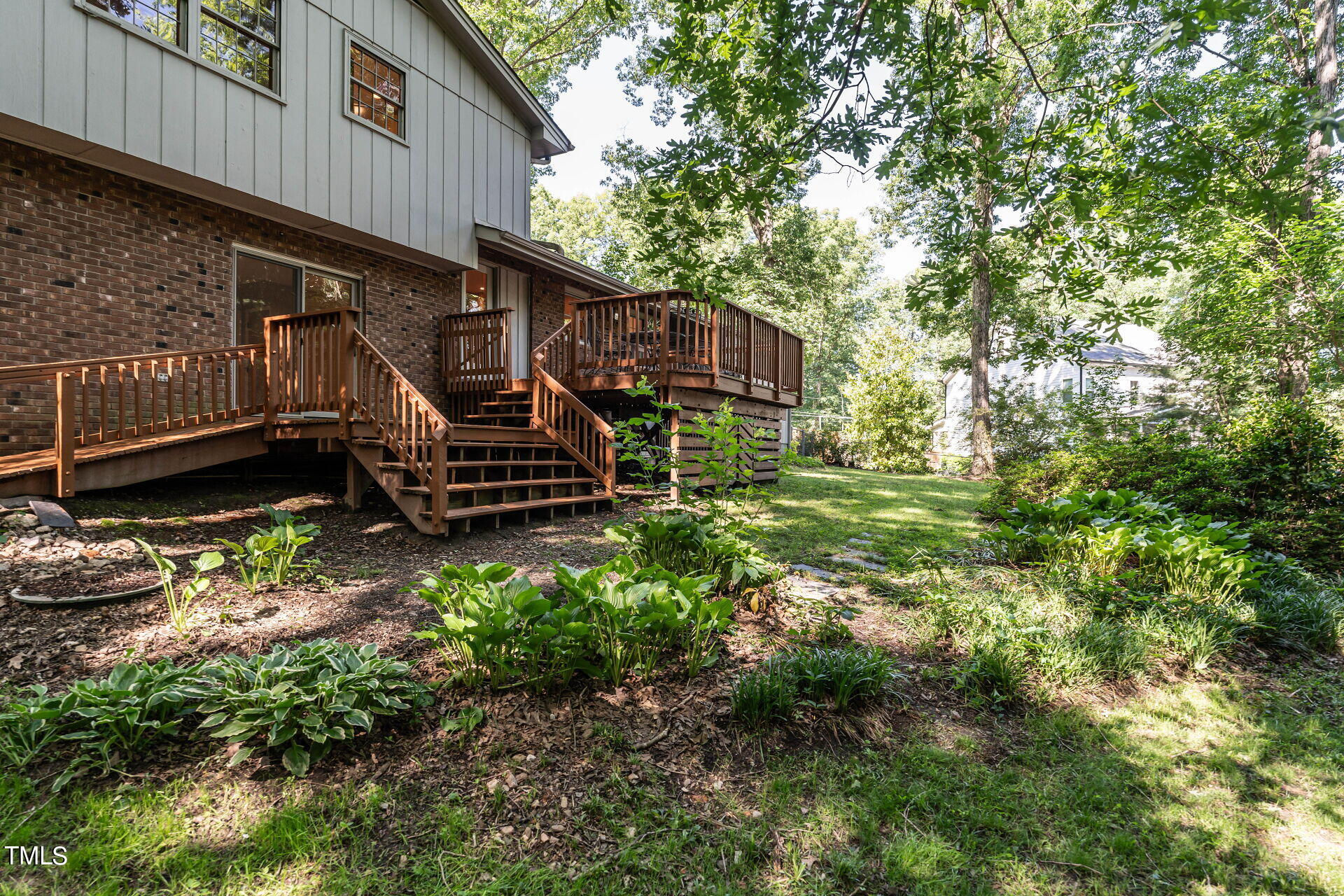 6604 Brandywine Road Raleigh, NC 27607 - Photo 42 of 46 a view of a house with a yard