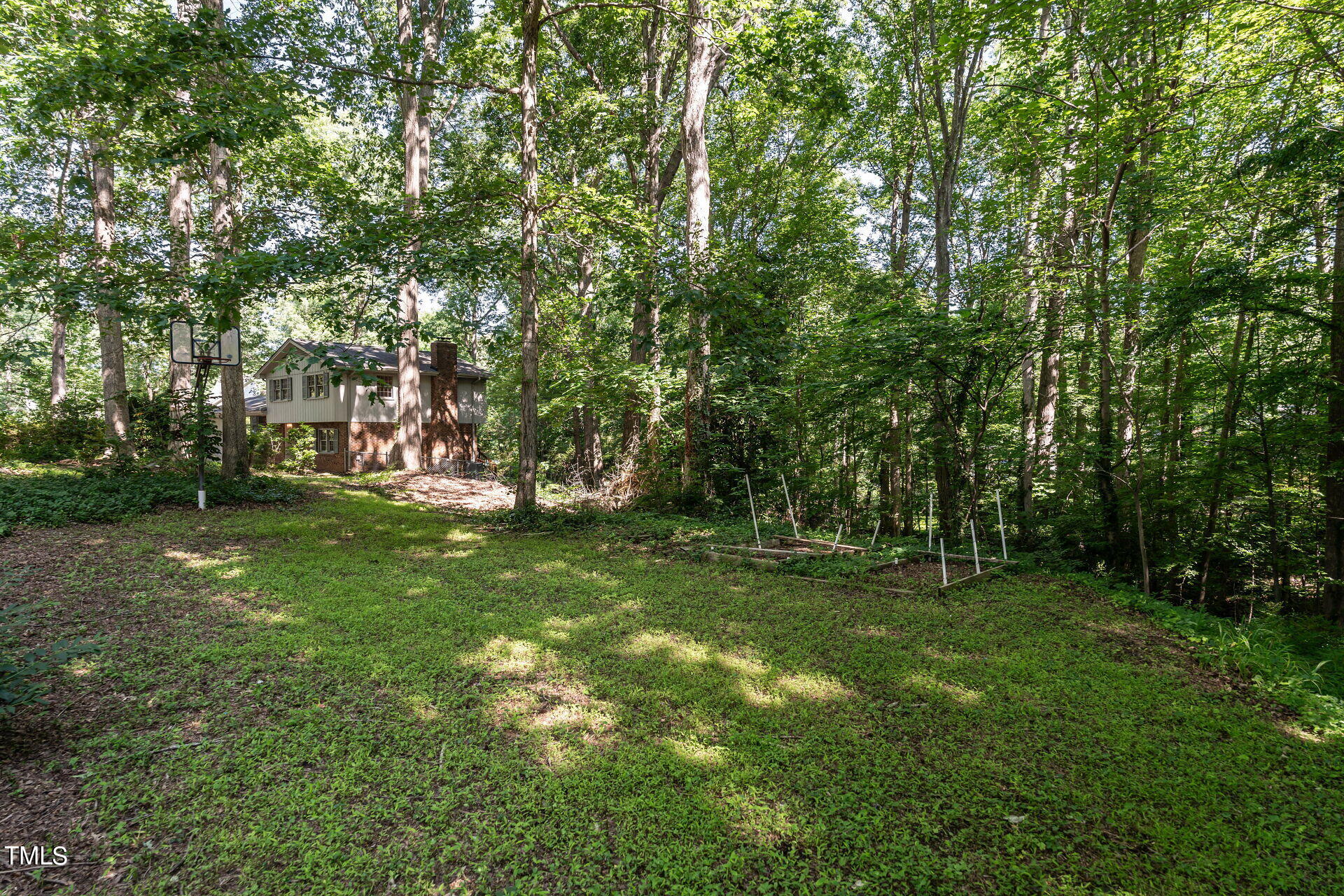 6604 Brandywine Road Raleigh, NC 27607 - Photo 43 of 46 a view of a park with trees in the background