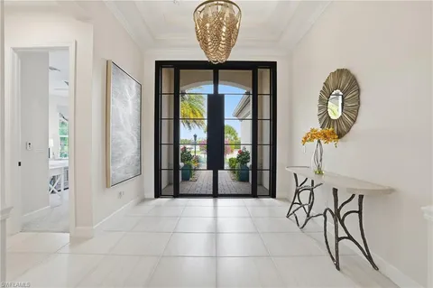 a view of entryway with a table and chairs