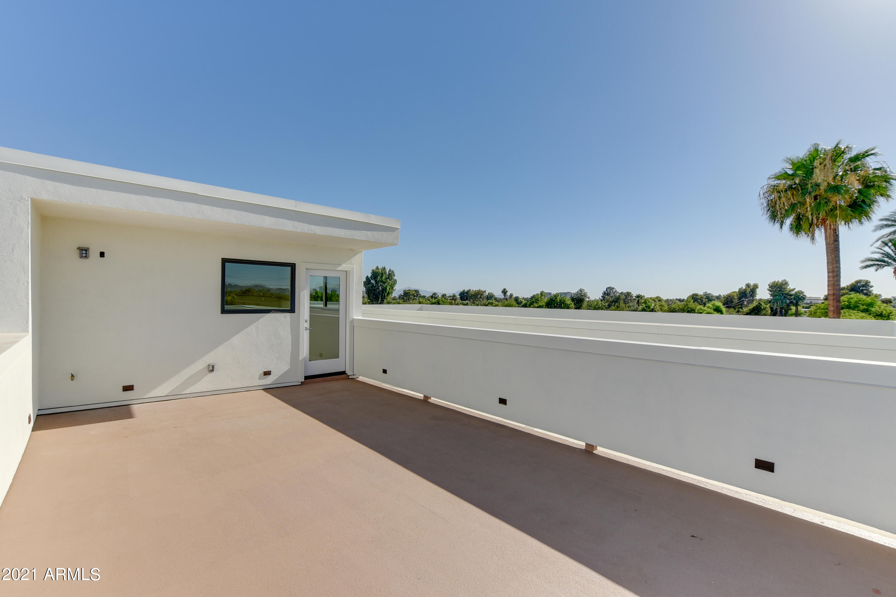 1111 East Missouri Avenue, Unit 3 Phoenix, AZ 85014 - Photo 17 of 24 a view of a terrace