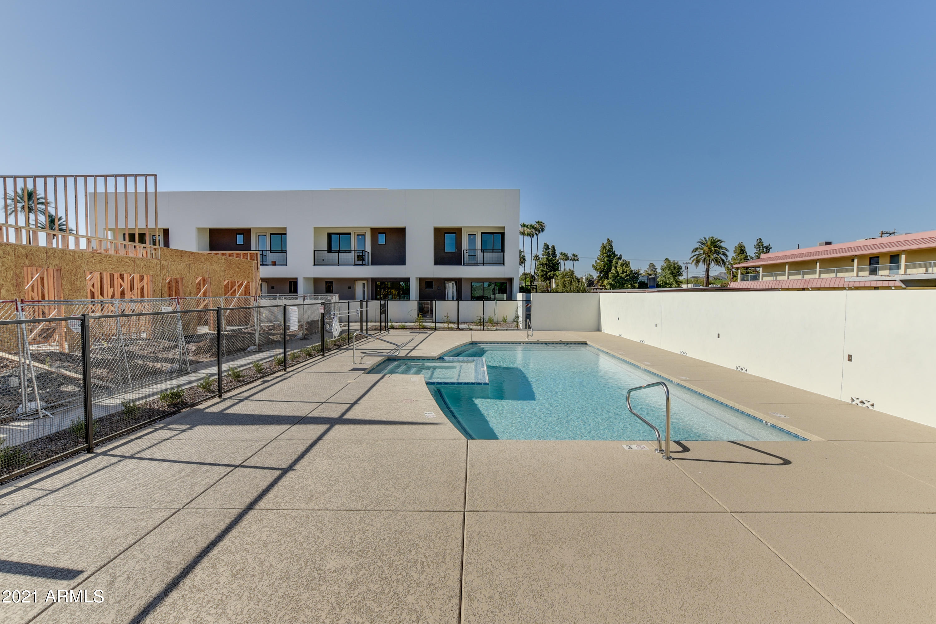 1111 East Missouri Avenue, Unit 3 Phoenix, AZ 85014 - Photo 18 of 24 a terrace with outdoor seating and city view