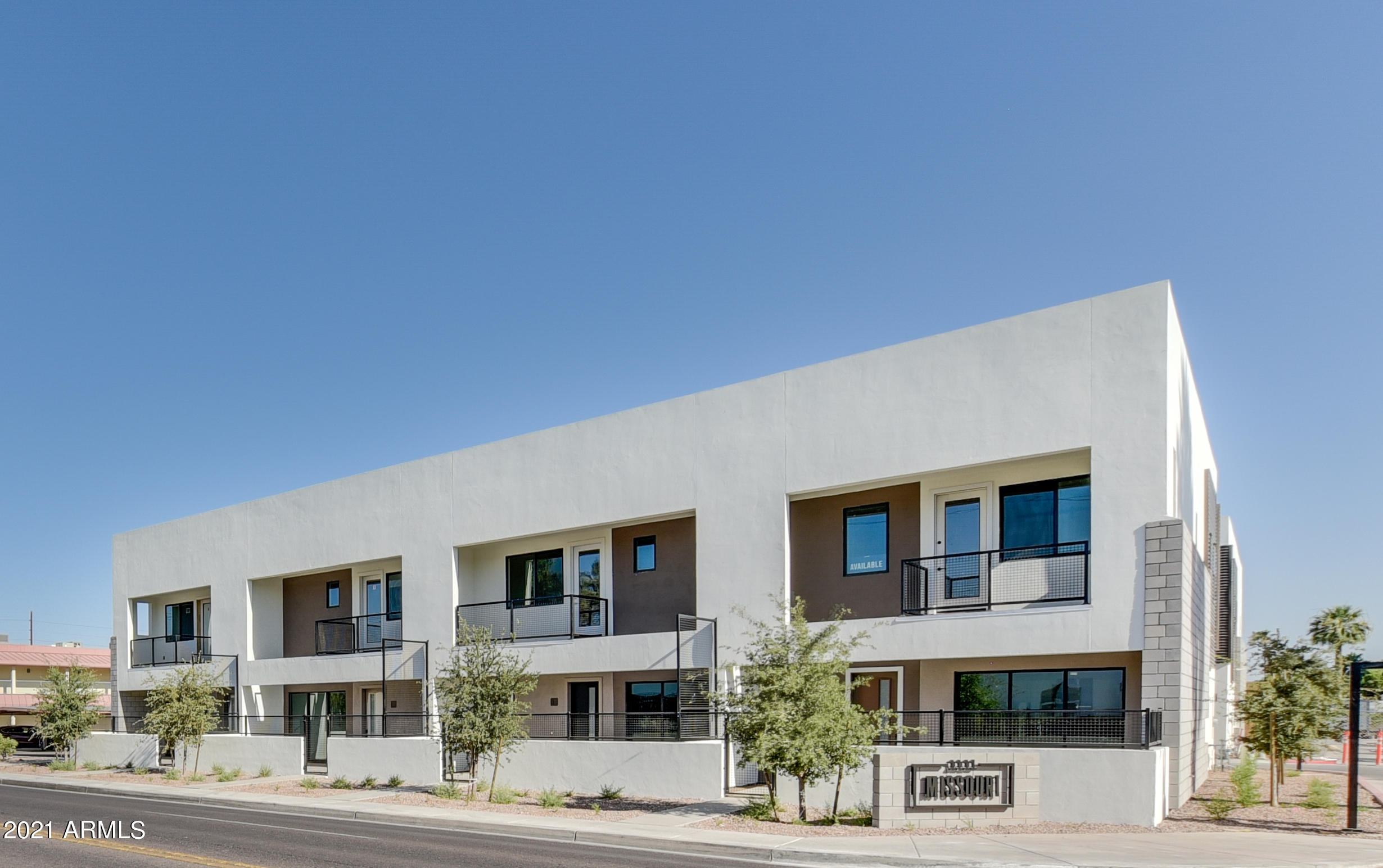 1111 East Missouri Avenue, Unit 3 Phoenix, AZ 85014 - Photo 21 of 24 a front view of building with street
