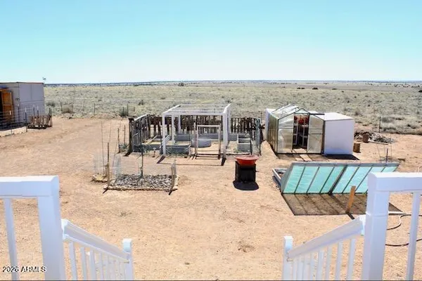 a view of a balcony with an ocean view