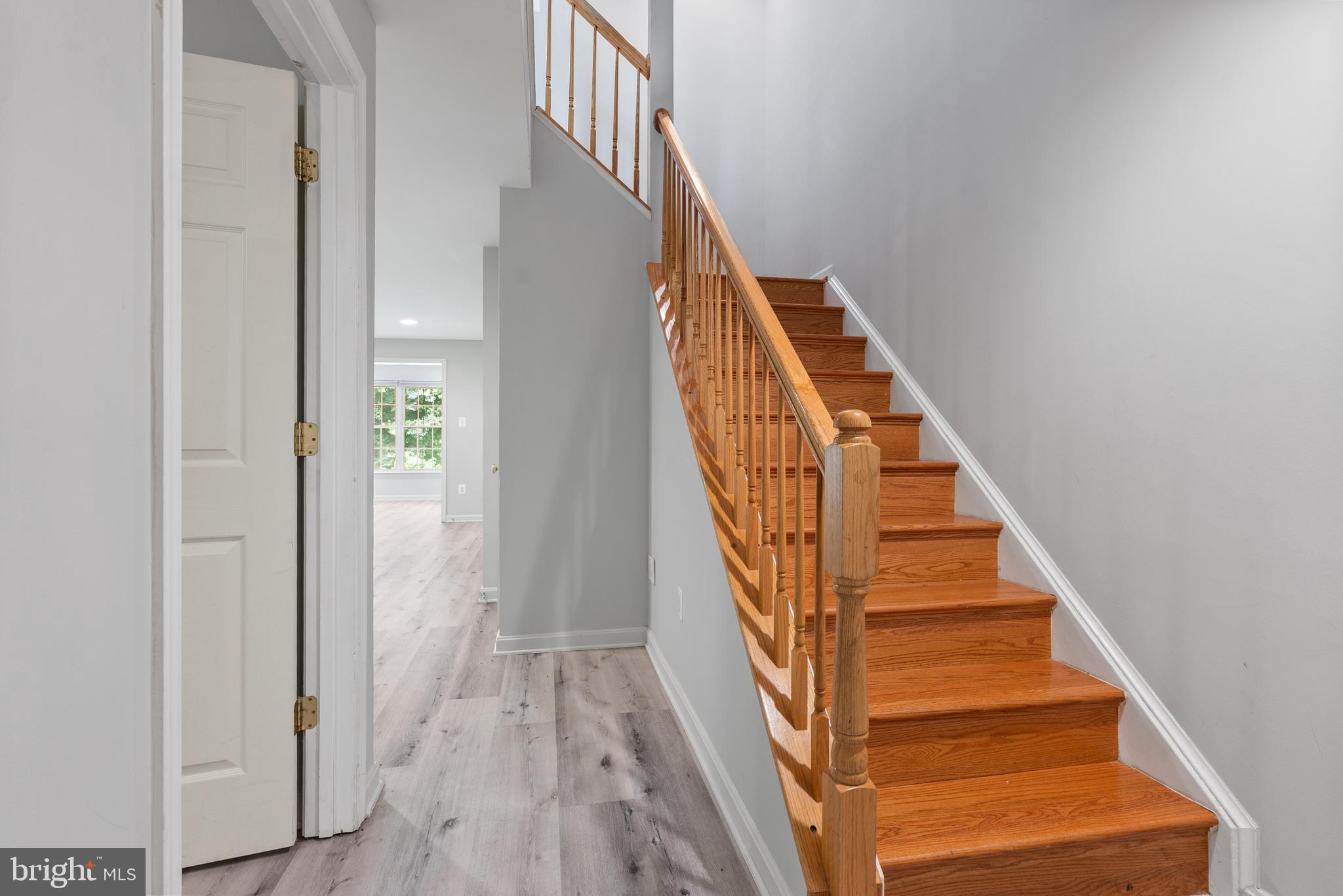 2452 Jostaberry Way Odenton, MD 21113 - Photo 30 of 41 Basement Stairs and Hallway