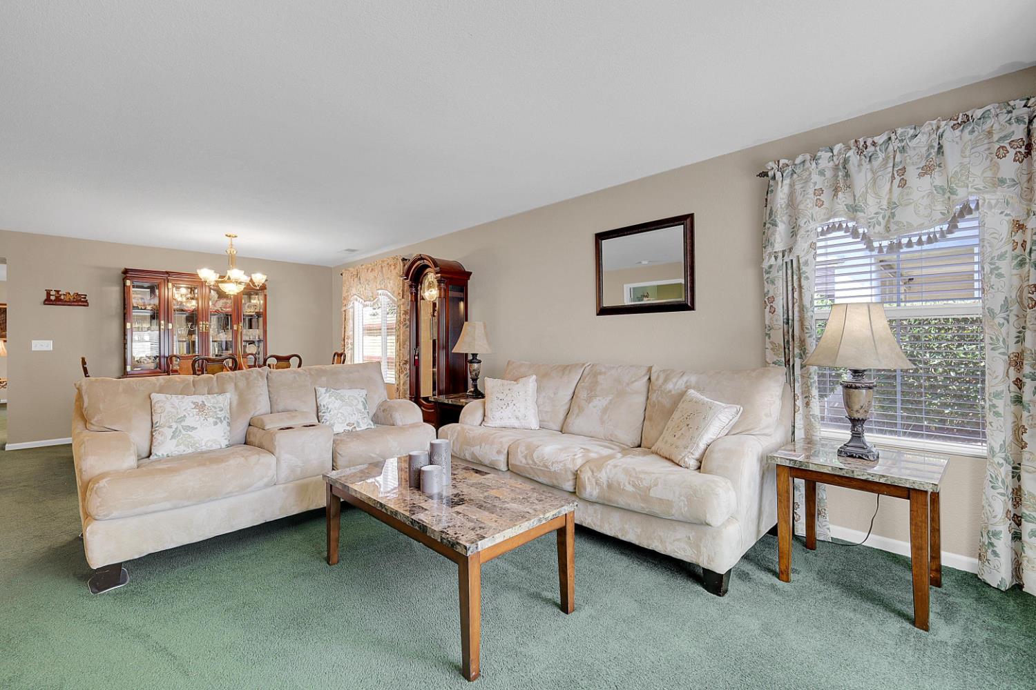 9840 Ellis Way Live Oak, CA 95953 - Photo 7 of 44 a living room with furniture and a large window