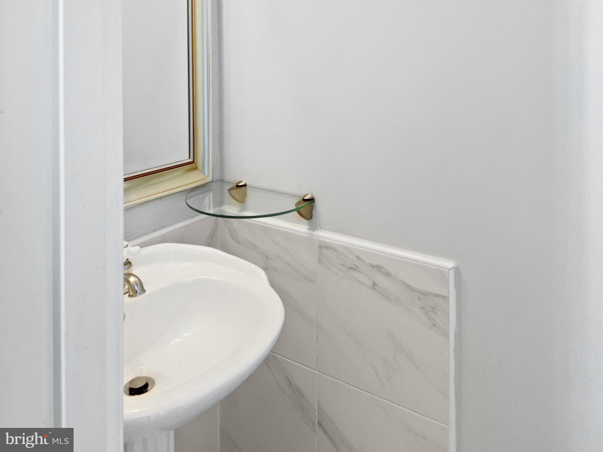 11184 Silentwood Lane Reston, VA 20191 - Photo 13 of 26 a bathroom with a sink