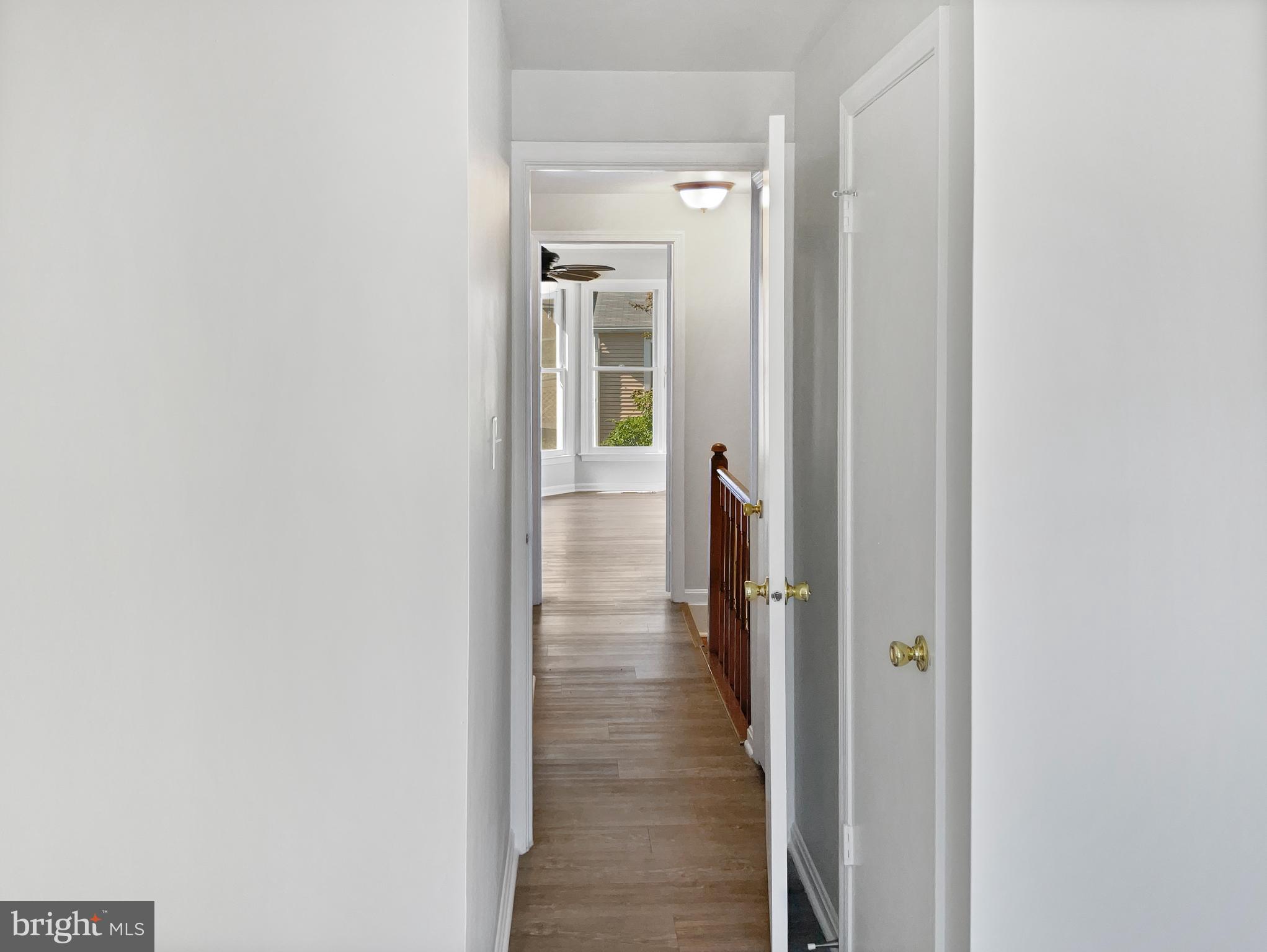 11184 Silentwood Lane Reston, VA 20191 - Photo 18 of 26 a view of a hallway with a room
