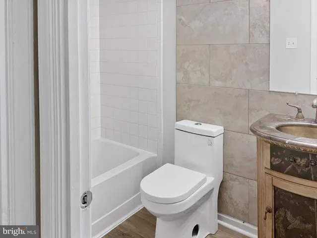 a view of staircase with white walls