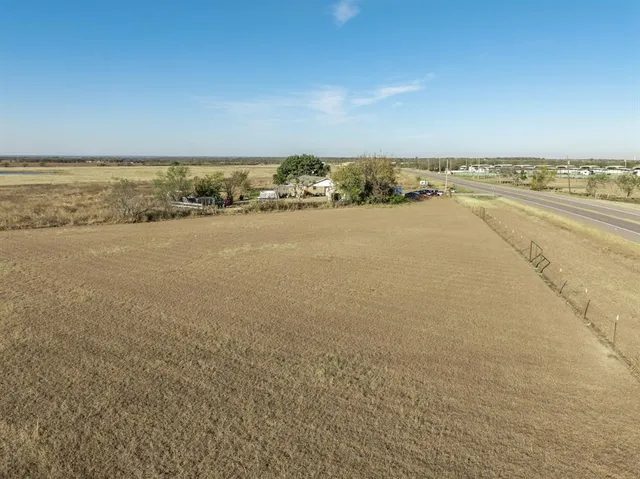 a open kitchen with cabinets table and chairs