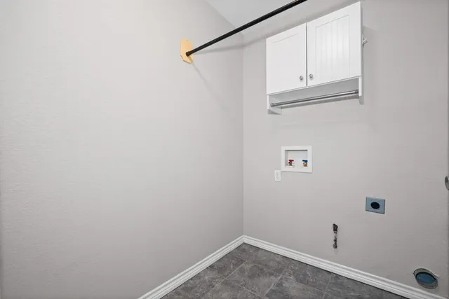 a bathroom with a granite countertop sink toilet a mirror a vanity and shower