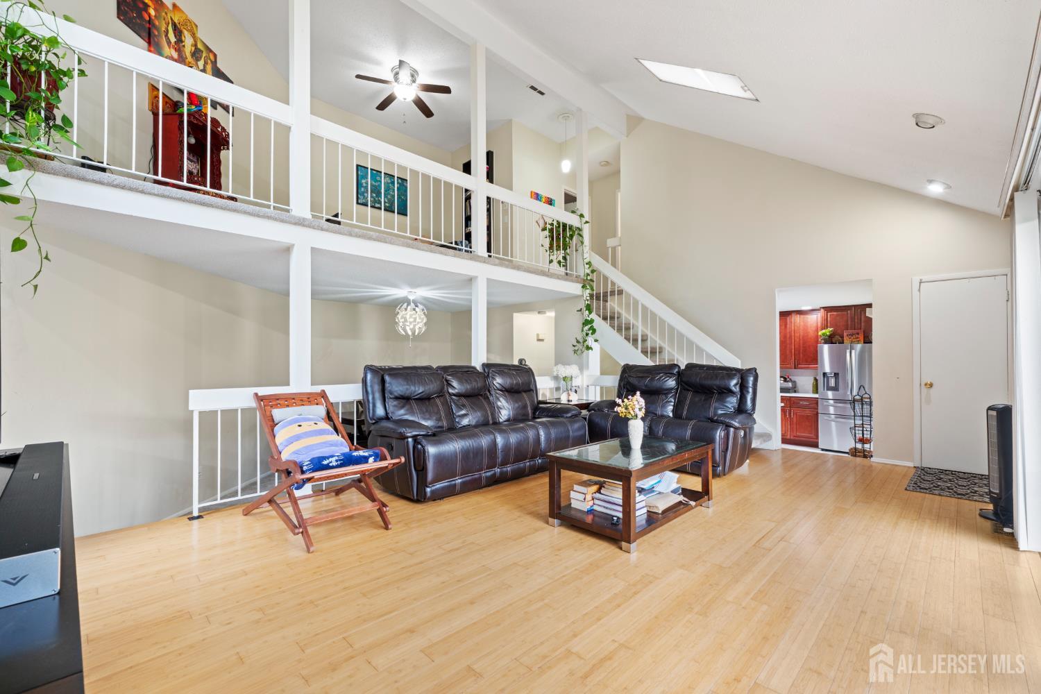 348 Westgate Drive Edison, NJ 08820 - Photo 13 of 43 a living room with furniture and a rug
