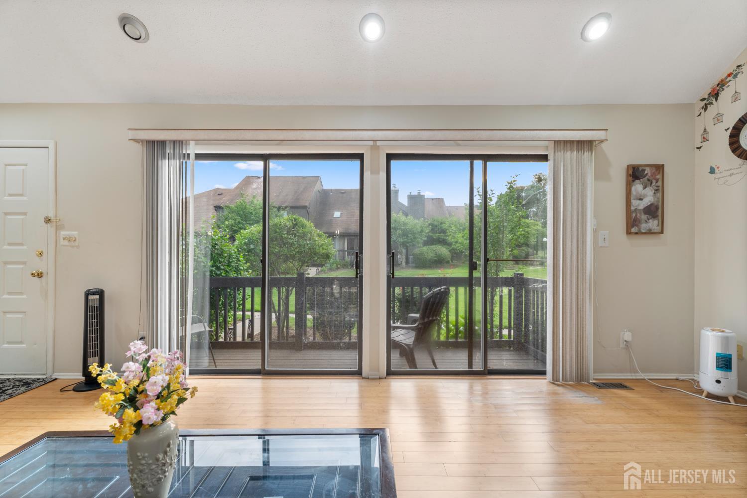 348 Westgate Drive Edison, NJ 08820 - Photo 14 of 43 a living room with furniture and a large window
