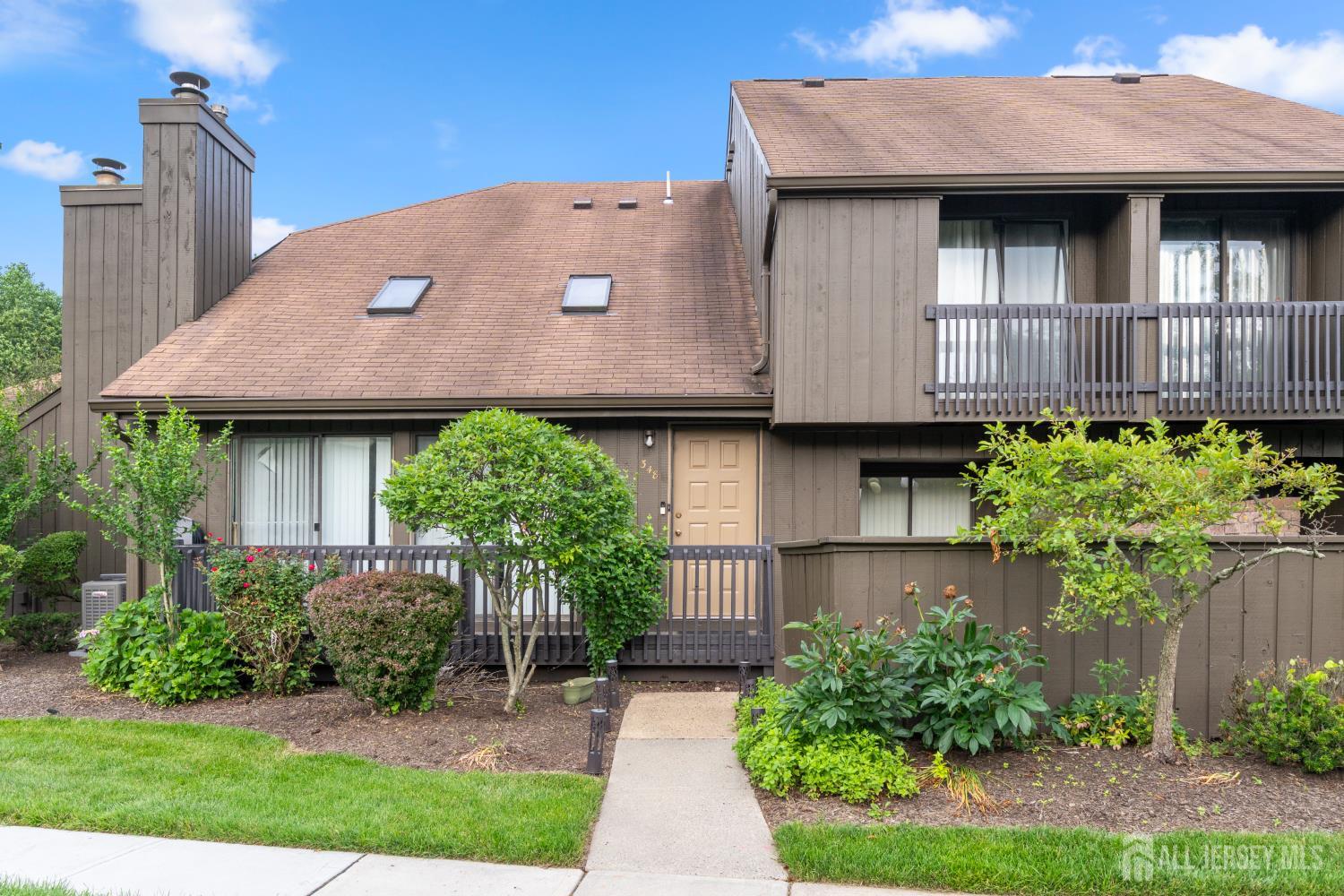 348 Westgate Drive Edison, NJ 08820 - Photo 2 of 43 a view of a house with a yard and potted plants