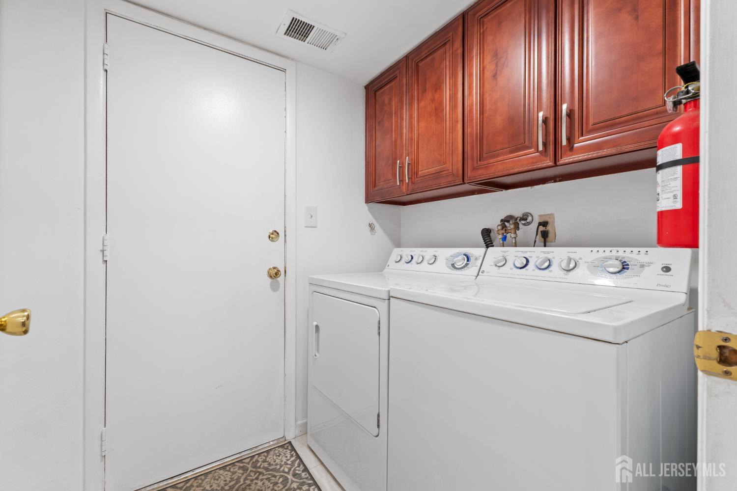 348 Westgate Drive Edison, NJ 08820 - Photo 24 of 43 a utility room with dryer and washer