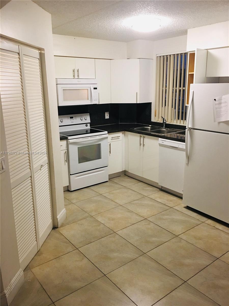 6115 Northwest 186th Street, Unit 202 Hialeah, FL 33015 - Photo 9 of 26