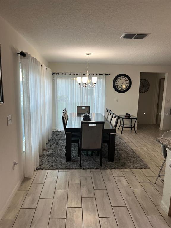 4668 Glencrest Loop St. Cloud, FL 34772 - Photo 2 of 5 an outdoor space with furniture