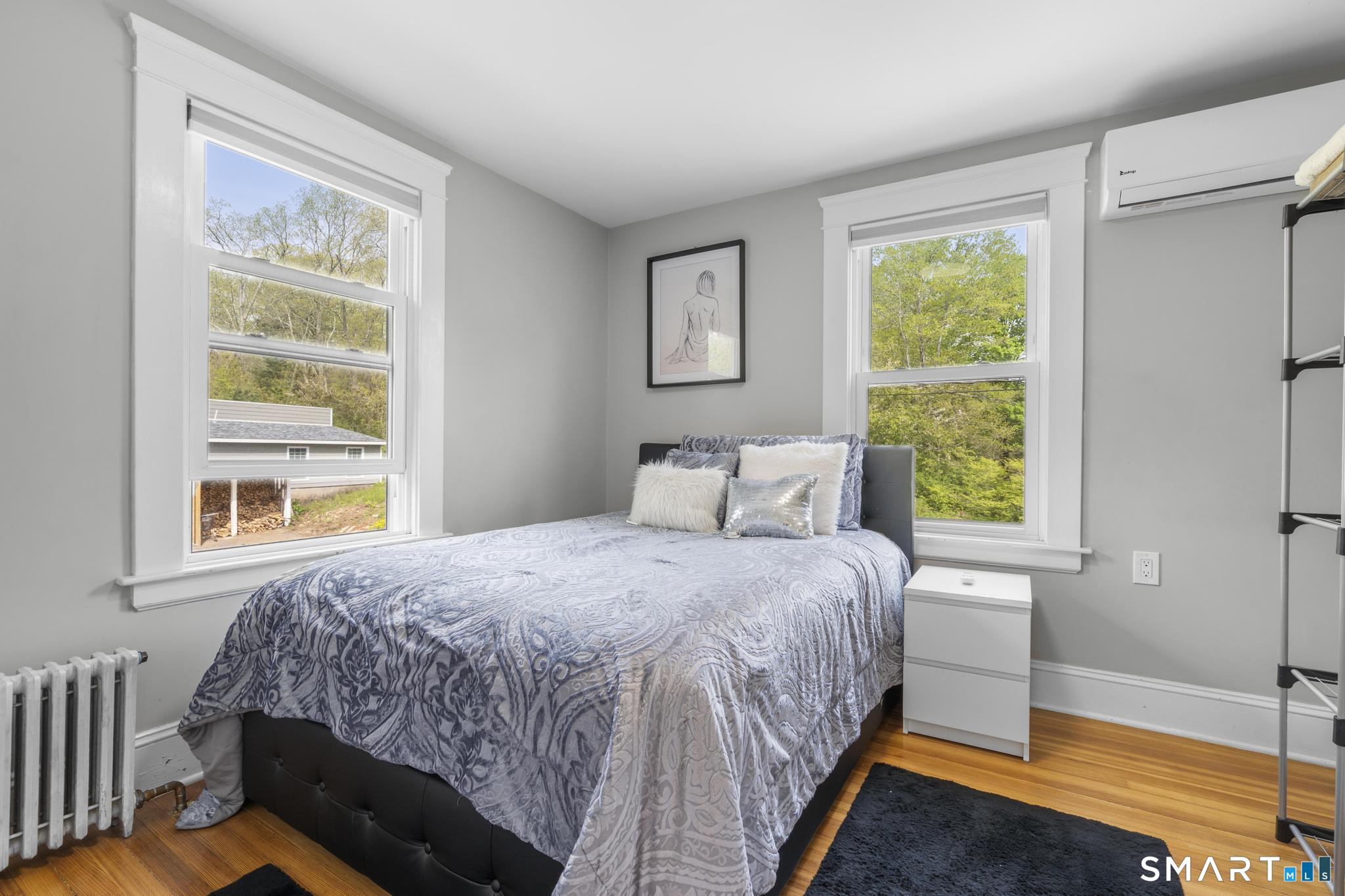 15 Pent Road Deep River, CT 06417 - Photo 21 of 36 a bedroom with a bed lamps and window