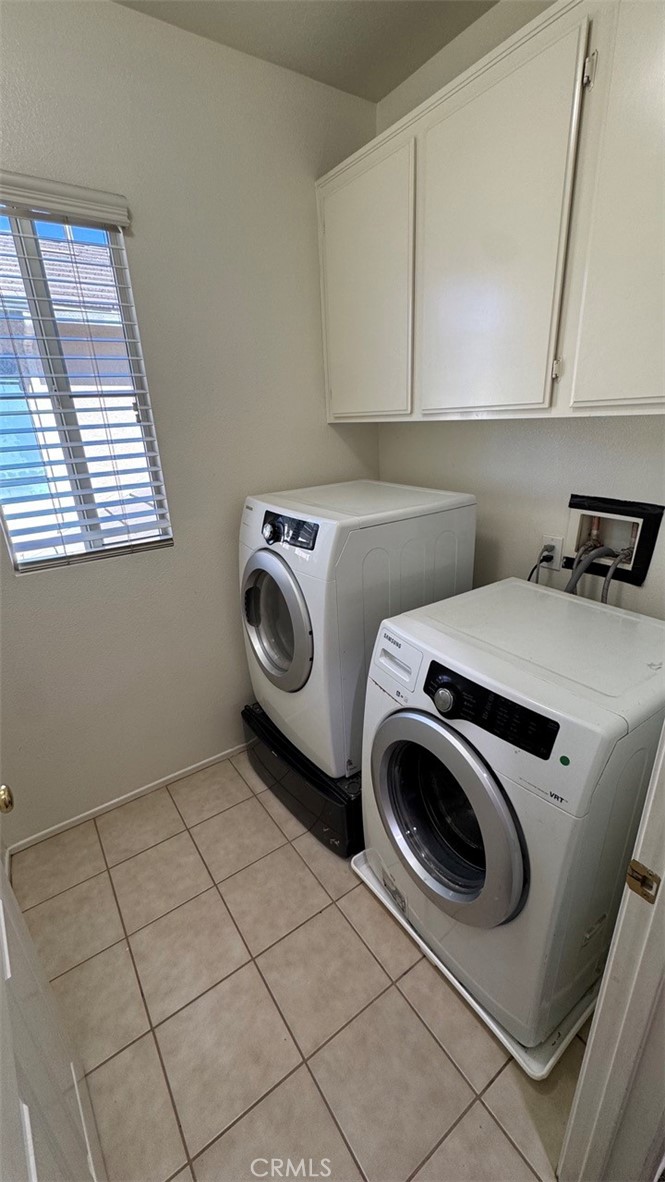 11332 Riverbury Court Riverside, CA 92505 - Photo 13 of 15 a utility room with dryer and washer