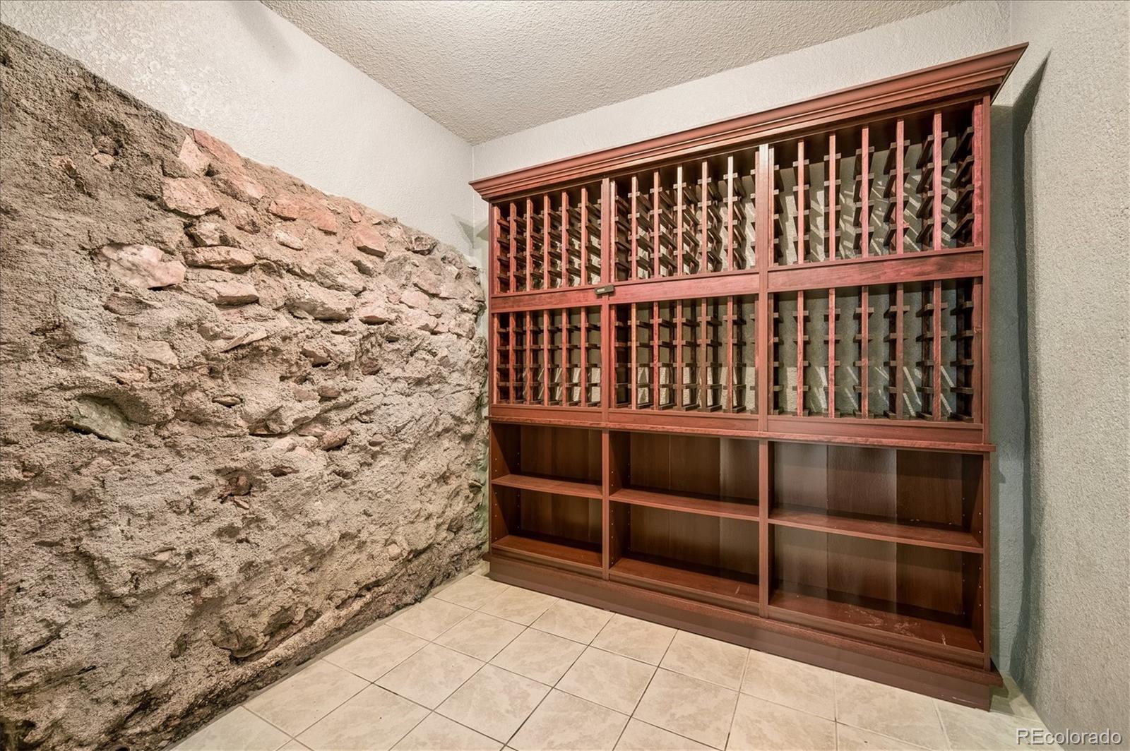 6747 South Brook Forest Road Evergreen, CO 80439 - Photo 31 of 49 a view of a wooden door
