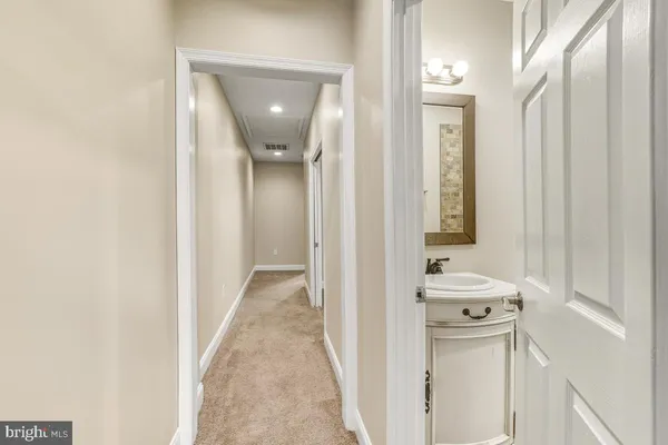 a view of a bathroom with tub and shower