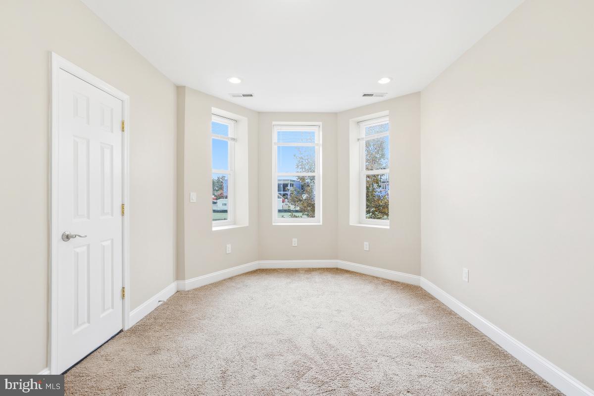 3117 11th Street Northwest Washington, DC 20010 - Photo 30 of 35 an empty room with windows