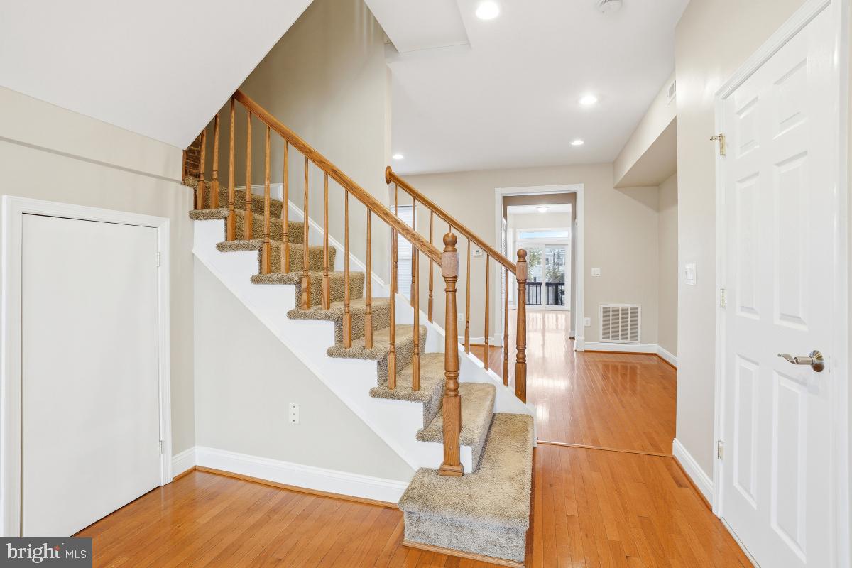 3117 11th Street Northwest Washington, DC 20010 - Photo 9 of 35 a view of entryway and hall with wooden floor