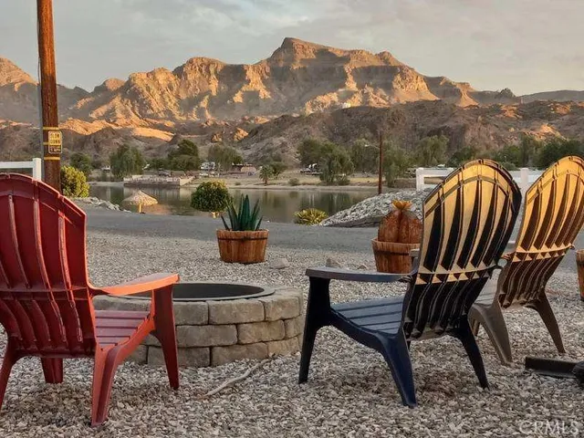 a view of a two chairs in the roof deck
