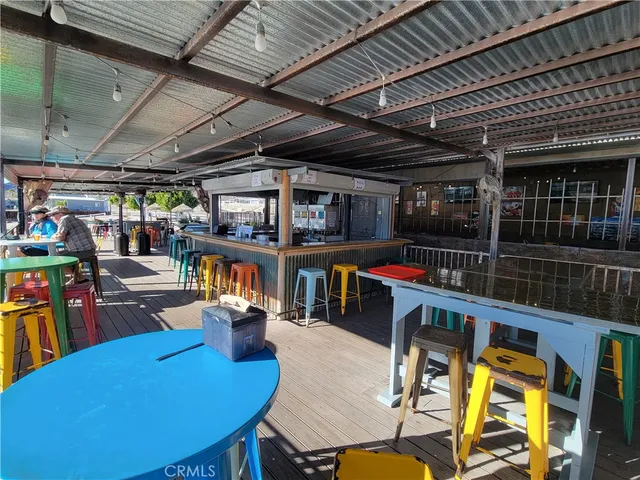 a view of a chairs and table in a room