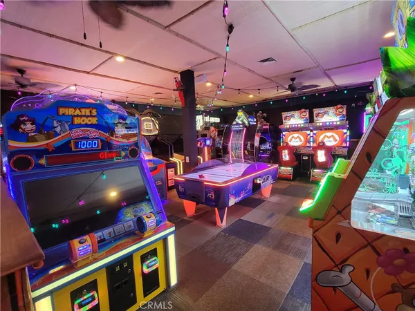 a area with lots of furniture and potted plants