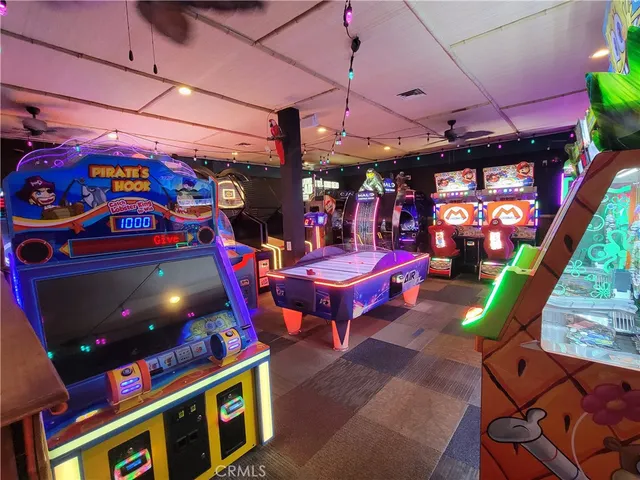 a area with lots of furniture and potted plants