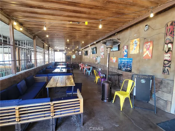 a room with lots of swings and furniture