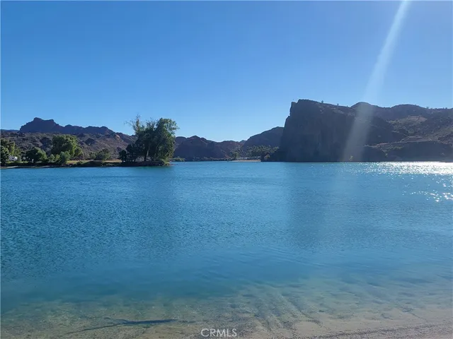 a view of swimming pool with a lounge chair