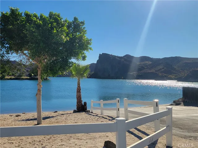 a view of a backyard with a sitting area