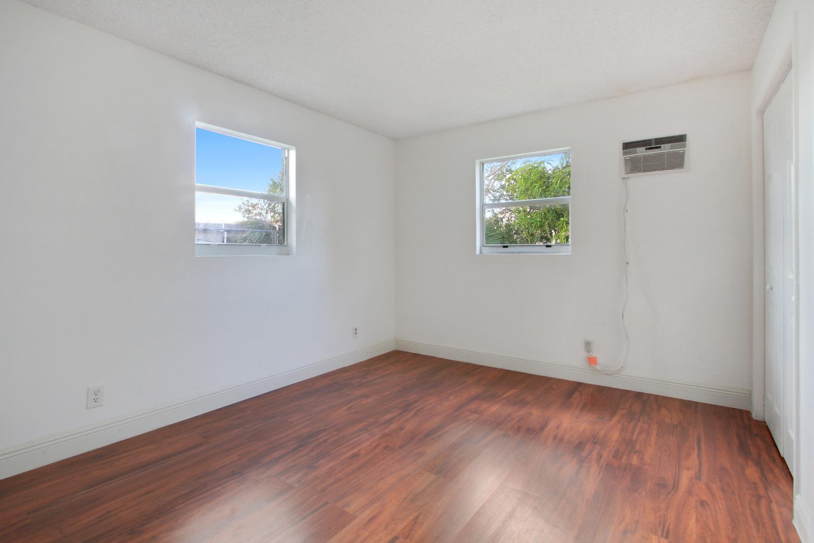 1248 West 33rd Street Riviera Beach, FL 33404 - Photo 5 of 10 6_bedroom1