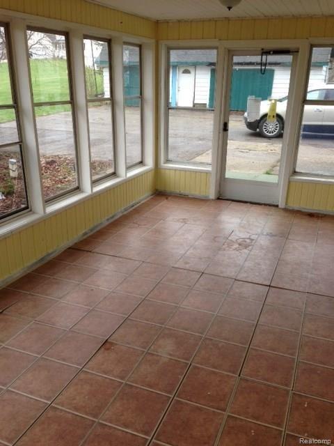 1640 County Farm Road Howell, MI 48843 - Photo 14 of 38 enclosed porch
