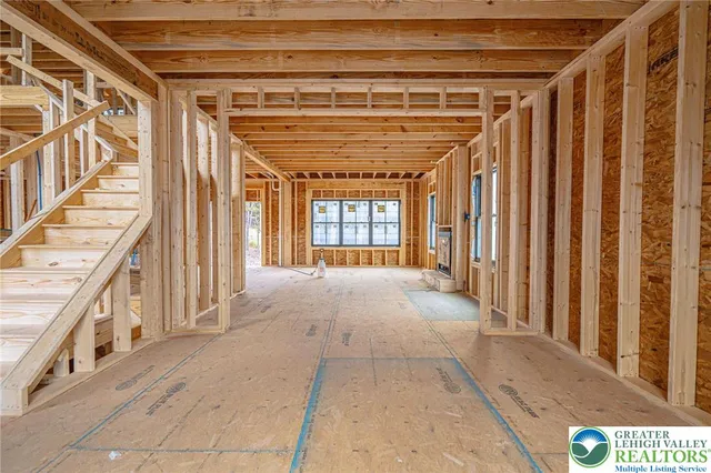an aerial view of a house with a garden