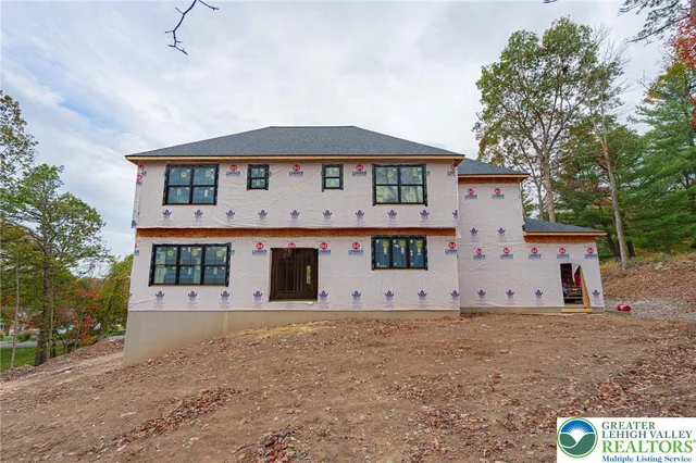a view of a room with a large window
