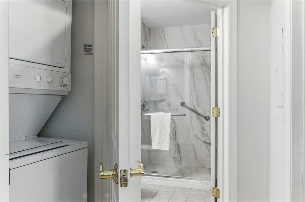 248 Albion Street, Unit 211 Wakefield, MA 01880 - Photo 12 of 24 a bathroom with a shower