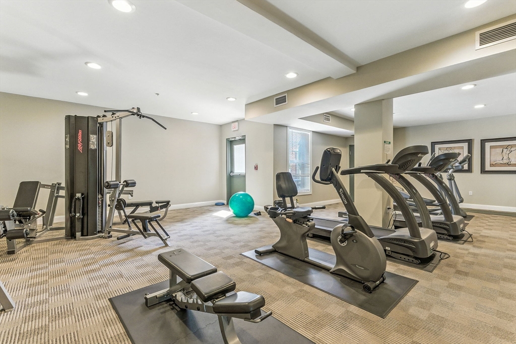 248 Albion Street, Unit 211 Wakefield, MA 01880 - Photo 18 of 24 a view of a room with gym equipment
