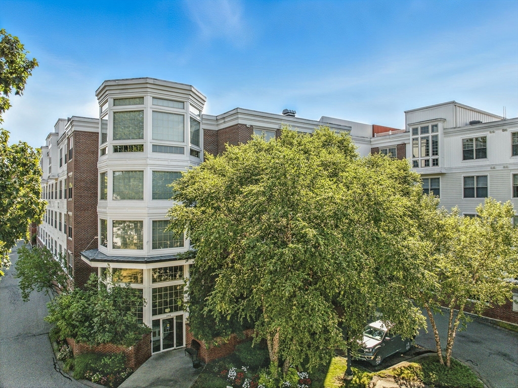 248 Albion Street, Unit 211 Wakefield, MA 01880 - Photo 23 of 24 a front view of a multi story building