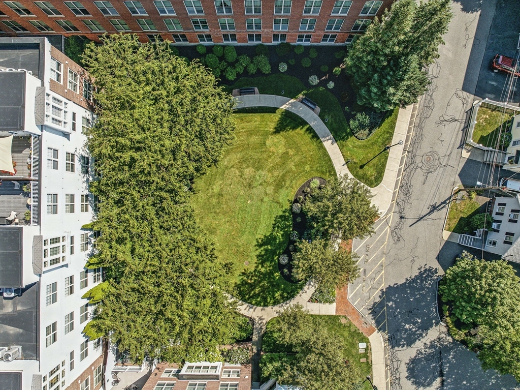 248 Albion Street, Unit 211 Wakefield, MA 01880 - Photo 24 of 24 an aerial view of residential house with outdoor space and swimming pool