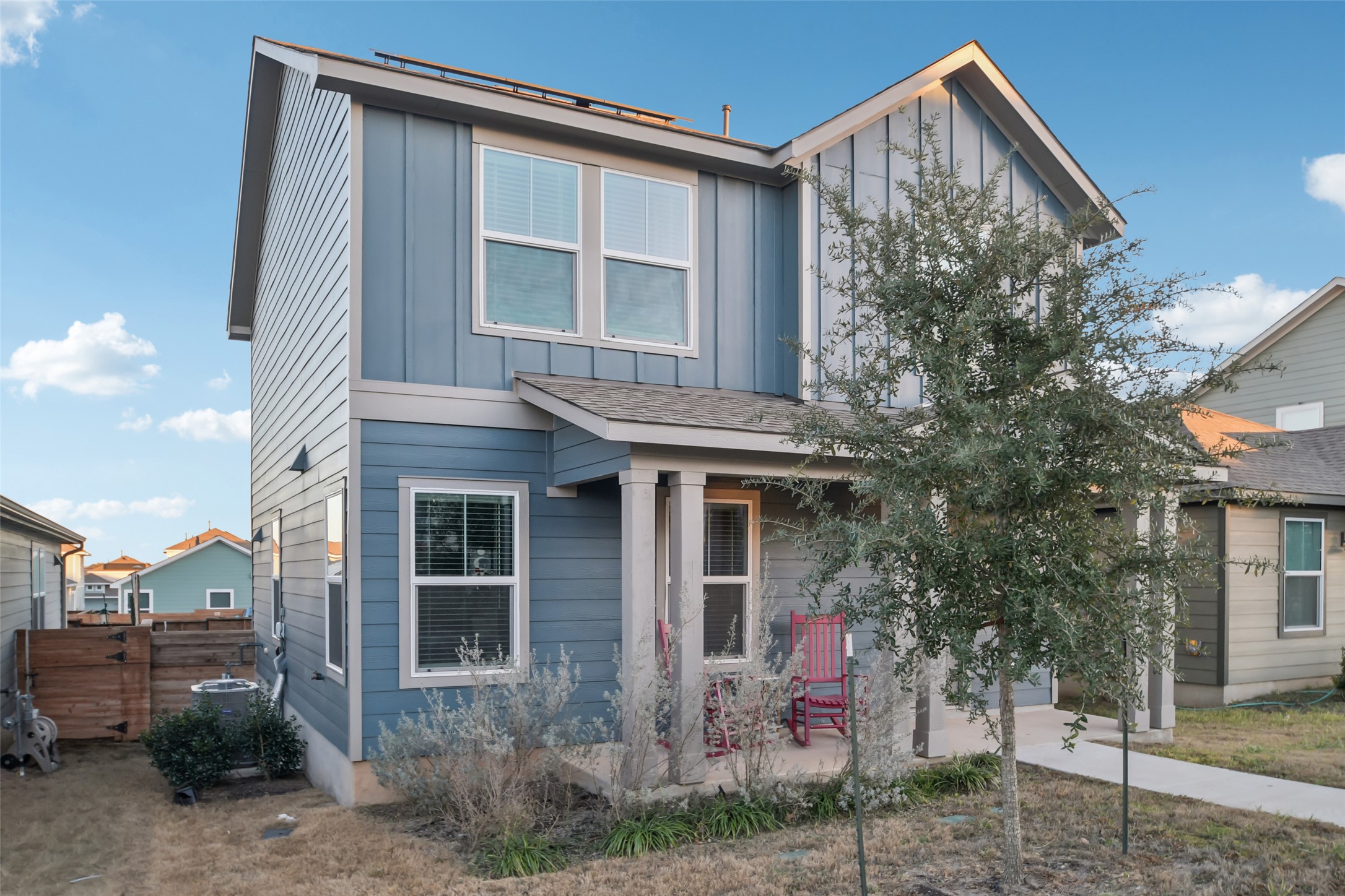 857 Powell Kyle, TX 78640 - Photo 3 of 28 View of front facade with board and batten siding and covered porch