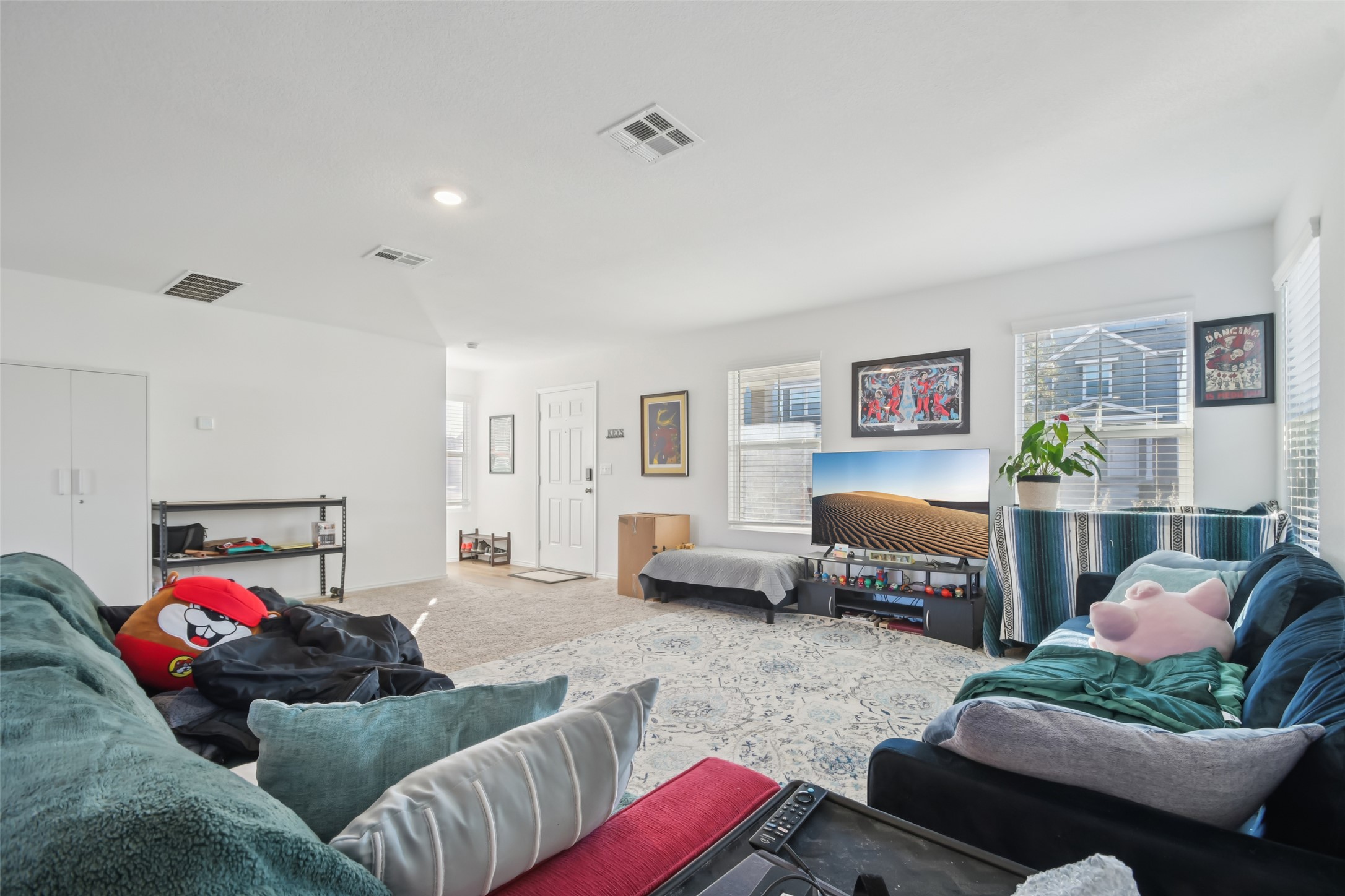 857 Powell Kyle, TX 78640 - Photo 6 of 28 Living area with carpet