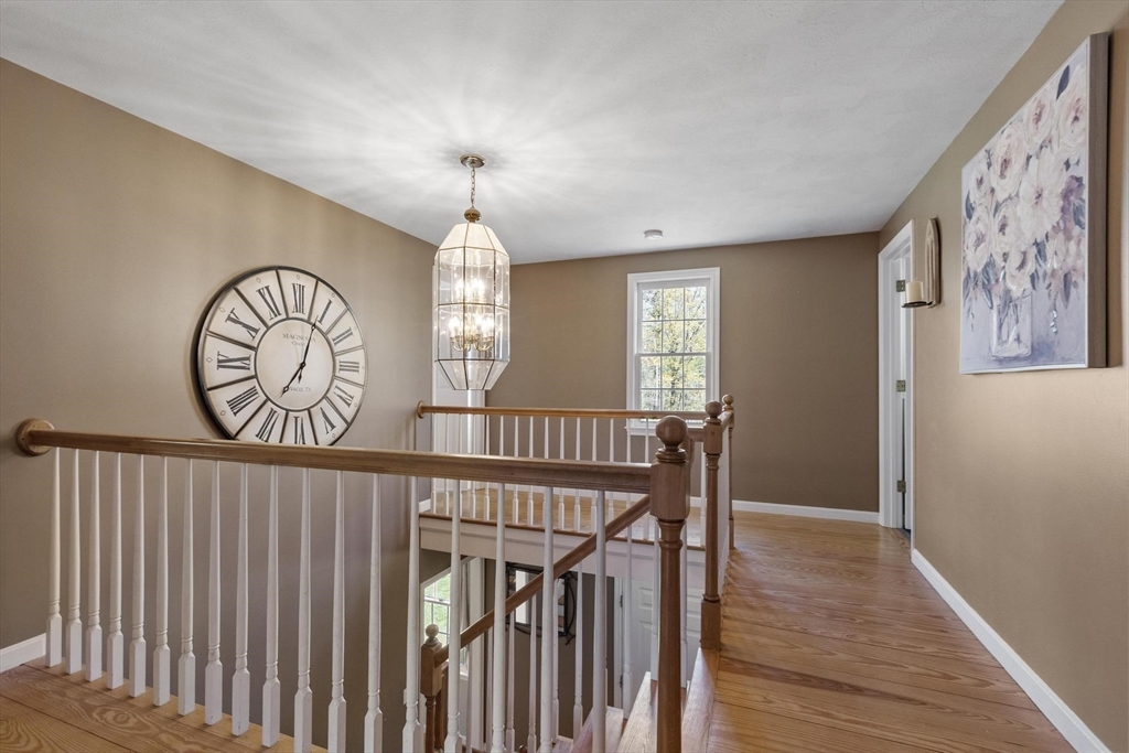 4 Ridge Road Pepperell, MA 01463 - Photo 28 of 42 a view of entryway with a window and wooden floor
